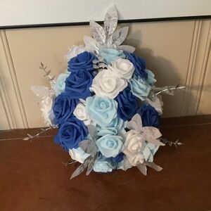 shades of blue w white rose cascade bouquet